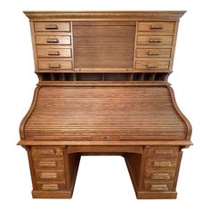 an old wooden desk with drawers on it