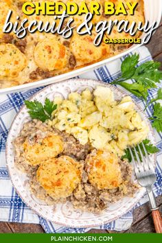 two plates filled with cheddar bay biscuits and gravy next to a casserole dish