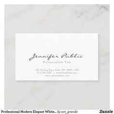 a white business card with the words professional elegant written in black ink on it, sitting on a marble surface