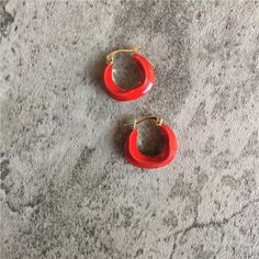 [MATERIAL]: Brass with enamel. [HOOP SIZE]: 20mm or 0.78" Red Enamel Hoop Earrings For Gifts, Red Enamel Hoop Earrings Gift, Small Hoop Red Earrings For Everyday, Trendy Small Hoop Red Earrings, Trendy Red Hoop Earrings, Trendy Small Red Hoop Earrings, Red Enamel Round Earrings, Red Round Enamel Earrings, Trendy Red Round Jewelry