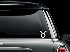 an image of a car with the zodiac sign on it's side window sticker