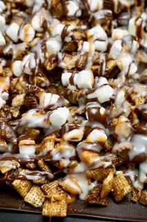 a tray filled with chocolate and marshmallows