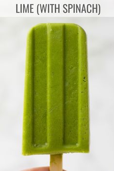 a green popsicle with text overlay that reads lime with spinach