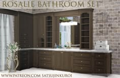 an image of a bathroom setting with brown cabinets and marble counter tops in front of a brick wall