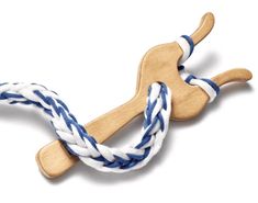 a wooden dog toy with blue and white rope on it's back end, against a white background