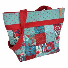 a blue and red bag with flowers on it