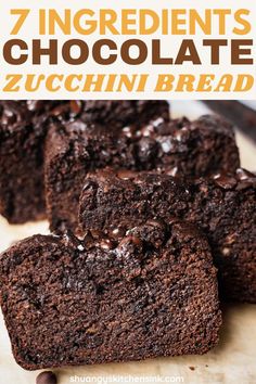 chocolate zucchini bread is cut in half and stacked on top of each other