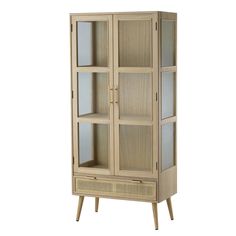 a tall wooden cabinet with glass doors on the front and bottom shelves in light wood