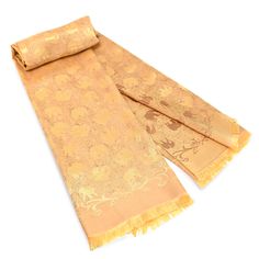 PRICES MAY VARY. Material: 100 Percent Silk | Color: Yellow / Gold Tone Style: Handmade, Fashion, Scarf Weight: 0.24 lbs | Size: One Size Overall Width: 28 in | Overall Length: 68 in Includes an official ‘AERAVIDA Fair Trade Sourcing’ Card with certified Seal of Authenticity. This gorgeous multipurpose scarf and shawl combination is made of beautiful handwoven silk and comes from Thailand’s very own, artisan Khun Sirin. She decorates this piece with a majestic elephant motif which creates a beau Elephant Motif, Majestic Elephant, Shawl For Women, Silk Fashion, Thai Silk, Yellow Silk, Fashion Scarves, Fashion Scarf, Handmade Fashion