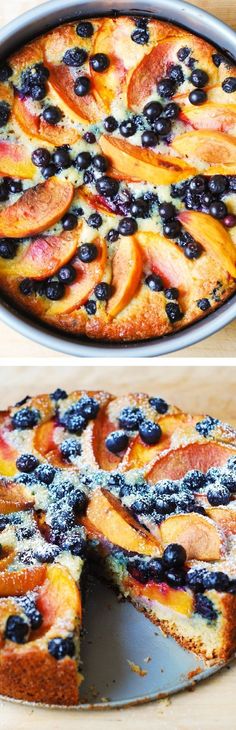 a cake with blueberries and peaches on it