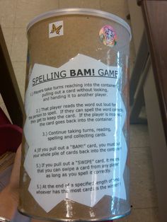 a can of spelling bami game sitting on the floor