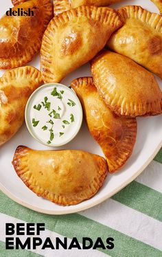 some food is on a white plate with a green and white table cloth next to it