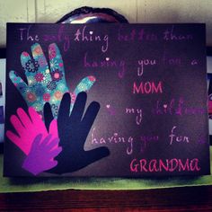 a handprinted sign with the words grandma written in pink, blue and purple