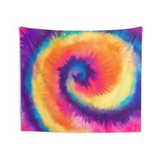 a multicolored tie - dyed tapestry hanging on a wall with an abstract spiral design