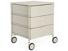 a white cart with three drawers and wheels on the front, side by side against a white background