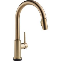 the kitchen sink faucet is shown in brushed brass finish, and features a pull - down spout