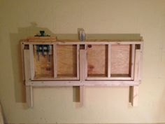 a wooden shelf with some drawers on it