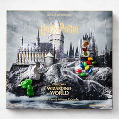 the front cover of harry potter magazine with gummy bears and balloons in front of hogwart's castle