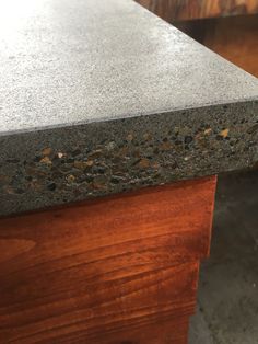 a close up of a counter top on a wooden table