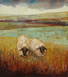 two sheep are standing in the tall grass