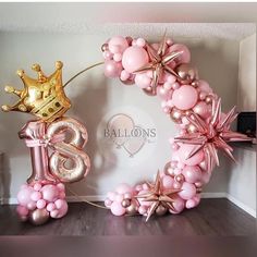 balloons are arranged in the shape of letters and crowns