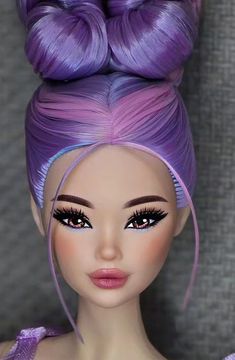 a doll with purple hair and big eyes