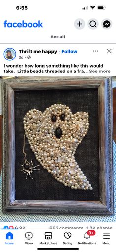 an image of a ghost made out of beads on a tablecloth with the caption's facebook page below it