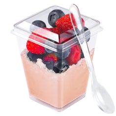 a plastic container filled with fruit and yogurt