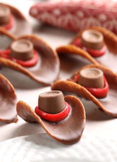 chocolate candies are arranged in the shape of hats