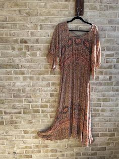 🌾gorgeous boho dress  Elastic waist with tie  🌾label: J Gee  Tag size: 2x  Care: machine wash  Content: rayon  No stretch  Bust:58" Waist:35-54" Hip:82" Length:53" 🌾great condition Bohemian V-neck Dress With Vintage Print, Bohemian Patterned Maxi Dress With Boho Print, Multicolor Bohemian Boho Dress With Paisley Print, Multicolor Bohemian Dress With Paisley Print, Patterned Bohemian Dress, Patterned Bohemian Boho Dress, Vintage Boho Printed Dress For Vacation, Flowy Printed Bohemian Dress, Bohemian Patterned Flowy Maxi Dress