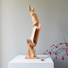 Introducing the 'Old Tree Reverie' sculpture, a stunning piece made from apple wood that brings the essence of nature into your home. Inspired by the graceful form of old trees, this sculpture rises vertically, gently twisting and tapering at the top. Smooth to the touch, natural wood tones complement the abstract design. Along its length, spiral indentations add depth and texture, creating a captivating visual and tactile experience. Ideal as a focal point in any space, the Old Tree Reverie scu Wooden Decoration, Old Tree, Old Trees, Wood Tones, Simplest Form, A Shelf, Wooden Decor, Color Shades, Art Object