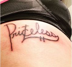 a woman's thigh with the word pizzles written in cursive writing