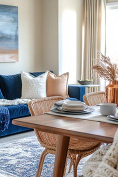 a living room filled with furniture and a blue couch