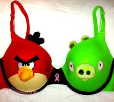 two angry birds shaped purses sitting next to each other