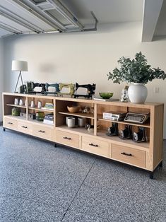 a large wooden shelf with many items on it