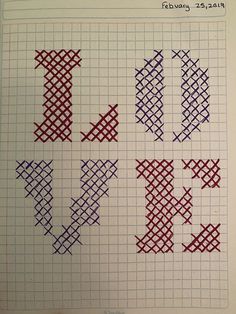 cross stitch alphabets in red, white and blue on a sheet of graph paper