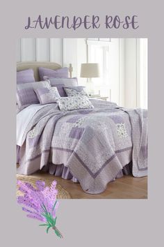 a bed covered in purple and white quilts