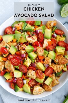 chicken avocado salad in a white bowl