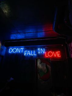 a neon sign that says don't fall in love