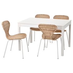 the table and chairs are all white with brown wicker seats on each one side