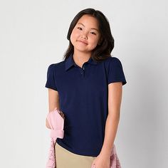 Perfect to complete a school uniform or paired with denim shorts for the weekend, this little and big girl's polo shirt from Thereabouts is a versatile wardrobe essential. It's made from soft cotton-jersey and has a spread collar, gathered shoulders, short sleeves, and a classic three-button placket.Closure Type: Button, Pullover HeadFit: Regular FitNeckline: Collar NeckSleeve Length: Short SleeveSleeve Style: Fitted SleeveApparel Length: 22.75 InchesFiber Content: 60% Cotton, 40% PolyesterFabri Basic Short Sleeve Polo Shirt For School, Fitted Cotton Polo Shirt For School, Fitted Solid Color School Shirt, Fitted Shirt For School, Solid Fitted School Shirt, Solid Cotton School Shirt, Fitted Solid Shirt For School, Fitted Casual Polo Shirt For School, Solid Color Cotton School Shirt