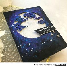 a card with the moon and stars on it