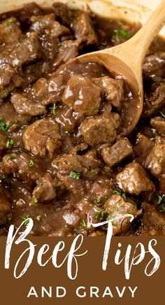 beef tips and gravy in a skillet with a wooden spoon on the side