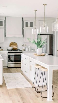 the kitchen is clean and ready to be used for cooking or dining room purposess