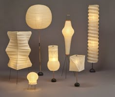 a group of lamps that are sitting next to each other