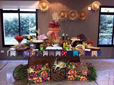 a table filled with lots of food and decorations