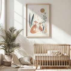 a baby's room with a crib, potted plant and artwork on the wall