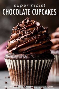 chocolate cupcakes with chocolate frosting and sprinkles on the top