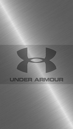 the under armour logo is shown on a metal background with silver and black accents,