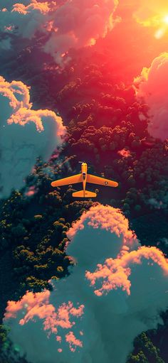 an airplane is flying in the sky above some clouds and trees with sun behind it